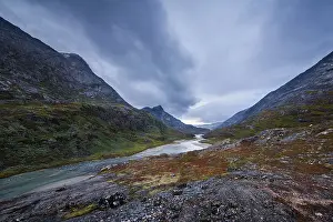 Deserted Mountain Scenery Prints: River valley, mountains, dramatic sky