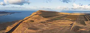 Deserted Coastal Area Spain Prints: Road on cliffs in evening light