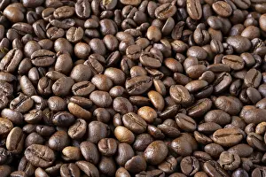 Prints of Roasted coffee beans background. Selective focus Arabica Prints: Roasted Coffee Beans Print