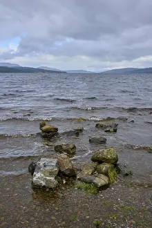 Prints of Rocks on the shore of a lake with small waves under a cloudy sky, Loch Rannoch, Kinloch Rannoch, Scotland, United Kingdom, Great Britain Lake Prints: Loch Rannoch Lake Shore Print, Scotland