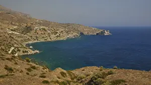 Greek Islands Landscape Prints: Rocky coastline overlooking calm