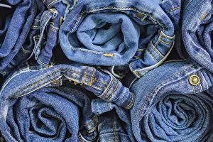 Blue Denim Jeans Prints: Roll blue denim jeans arranged in stack
