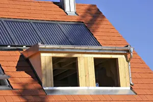 Construction Site Worker Prints: Roofer working on a new dormer window