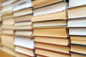 Learning Environment Prints: Rows of books in the library. Background for text