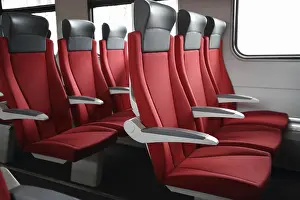 Rail Traffic Transport Prints: Rows of red seats in modern train