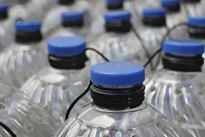 Environmental Issue Plastics Prints: Rows translucent plastic bottles close to