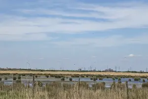 United Kingdom Travel Photography Prints: RSPB Rainham marshes nature reserve view across a lagoon