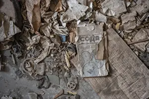 Rundown Residential Building Prints: Rubbish and old instructions in Cyrillic script