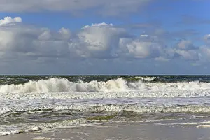 Blue Sky Daytime Scene Prints: Running out waves on the sandy beach