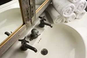 Deserted Bathroom Scene Prints: Rustic bathroom sink and mirror