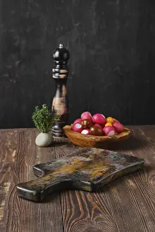 Fresh Vegetables Photography Prints: Rustic kitchen table with fresh vegetables and pepper mill blurred on background