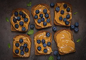 Rye Bread With Peanut Paste Prints: Rye bread with peanut paste and fresh blueberries