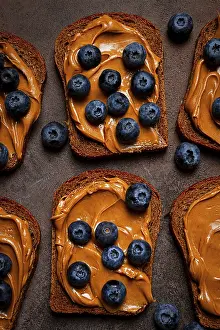 Rye Bread With Peanut Paste Prints: Rye bread with peanut paste and fresh blueberries