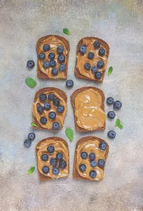 Gourmet Food Prints: Rye bread with peanut paste and fresh blueberries