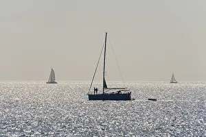 Evening Sun Reflections Prints: Sailing ship, back light, reflections