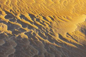 Arabian Peninsula Desert Prints: Sand structure formed by the wind