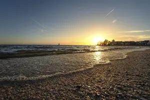 Deserted Dutch Coast Prints: Sandy beach beach with waves at sunset