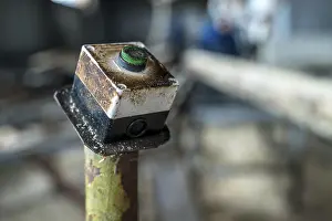 Industrial Architecture Style Prints: Sawmill. Image of machine power button, close-up