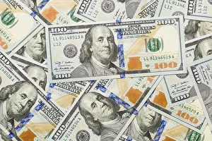One Hundred Dollar Note Prints: Several scattered layer of the newly designed U