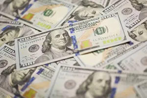One Hundred Dollar Note Prints: Several scattered layer of the newly designed U