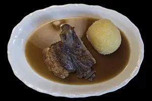 Southern Germany Cuisine Prints: Schauferle with dumpling on black background