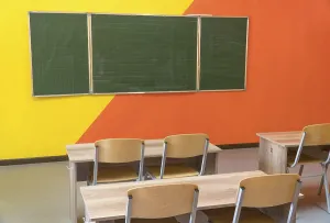 Empty Classroom Prints: An empty school classroom with a blackboard