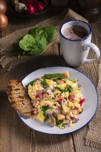 Scrambled Eggs With Tomatoes Prints: Scrambled eggs with tomatoes and spinach