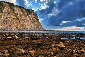 Yorkshire Coast Prints: Sea cliff, dramatic cloudy sky