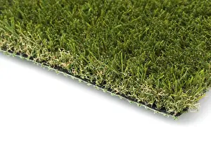 White Background Studio Prints: Section of artificial turf grass on white background