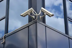 CCTV Camera Installation Prints: Two security cameras on the corner of a building