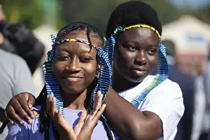 Prints of September 17, 2023. Belarus. city of Gomel. A holiday of ethnic cultures of different peoples and nationalities.African girls in traditional headdresses close-up Belarus Prints: Print: Gomel Celebrates Ethnic Cultures, September 17, 2023