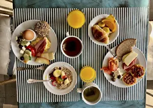 Table Setting For Two Prints: Set table with breakfast for two