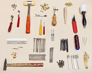 Sewing Shop Equipment Prints: Set with various leather tools on a natural leather surface