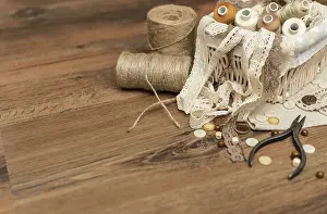 Sewing Concept Prints: Sewing concept. Thread spools, buttons and sewing needles