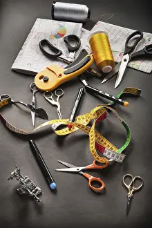 Empty Office Supply Prints: Sewing tools thread with scissors and measuring tape on dark