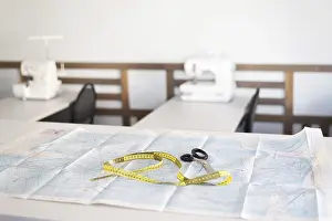Sewing Workshop Prints: A sewing workshop featuring essential tools including scissors