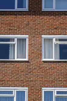 Uninhabited Urban Environment Photo Prints: Shapes and pattern of four windows in a block of flats