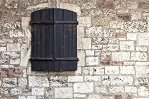Abandoned Castle Walls Prints: Shuttered window in a castle wall
