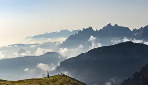Sexten Dolomites Italy Prints: Silhouettes of mountains with small clouds in between