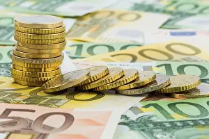 Prints of Single stack of coins, lying coins, symbolic photo for capital investment, risk and profit collapse Austria Liechtenstein Prints: Austrian Capital Investment Print: Risk and Profit Collapse