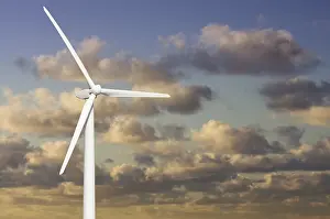 Blue Sky Prints: Single wind turbine over dramatic blue sky and clouds