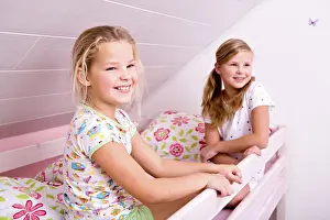 Childhood Friendship Moments Prints: Two sisters in bed, getting up
