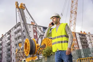 City Urban Environment Prints: Site manager and technical engineer observing the city construction site