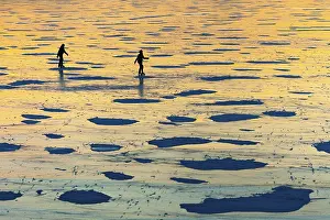 Northern Germany Scenes Prints: Skating on the ice of the Dummer in winter at sunset