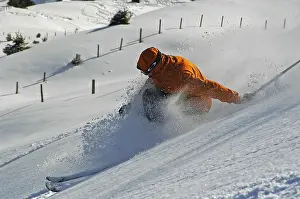Skier In Deep Snow Prints: A skier in deep Snow
