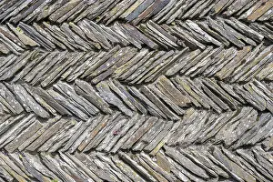 British Architecture Images Prints: Slate slabs stacked in a herringbone pattern to form a wall