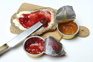 Food Photography Basics Prints: Slice of bread with jam and jam in portion pack