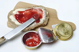 Basic Food Images Prints: Slice of bread with jam and jam in portion pack
