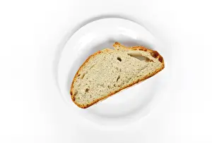 High Angle View Plate Prints: A slice of bread on a plate