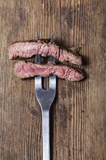 Grocery Store Food Pics Prints: Slice a steak onto a meat fork